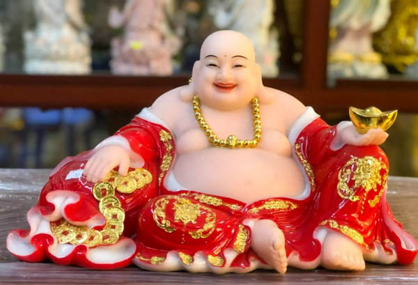 Sử dụng vật phẩm phong thủy như Tượng Phật Di Lặc tăng vận khí